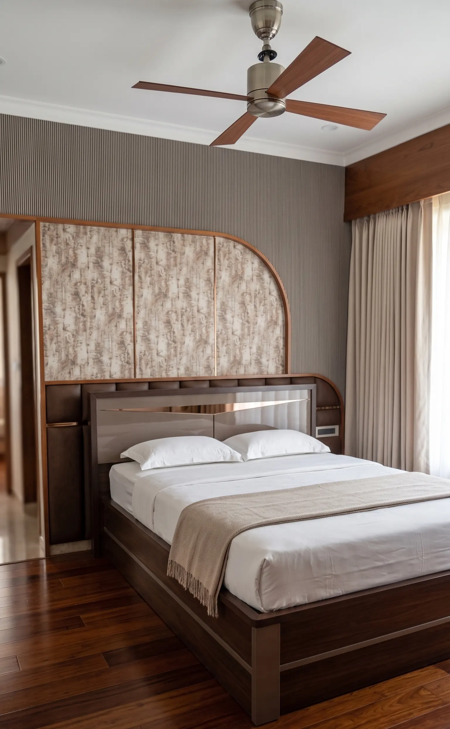 Elegant master bedroom with designer headboard and lighting