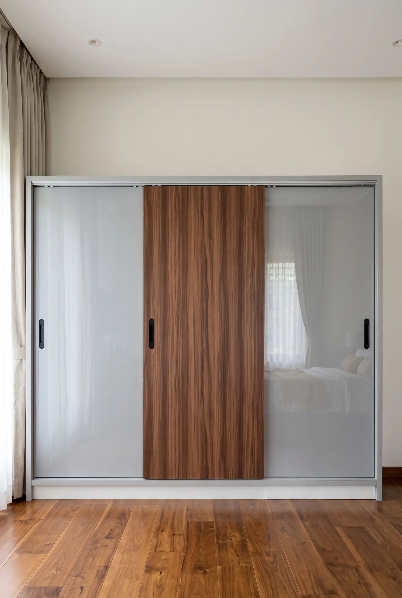 Contemporary bedroom interior with sliding wardrobe